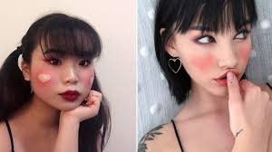 makeup artists are applying blush in