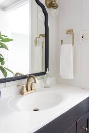 Trying to decide if delta champagne bronze faucets and fixtures are right for your home? Basement Bathroom Makeover Shades Of Blue Interiors