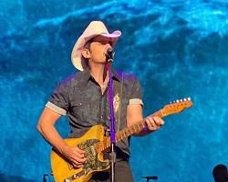 Brad Paisley performing on stage