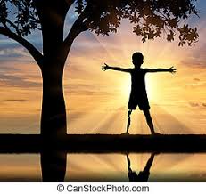 Photos of sad little boy sitting on a stump, against the background of the sunset sky. Help Children With Disabilities Concept Happy Disabled Boy With A Prosthetic Leg Standing In The Helping Hands At Sunset Canstock
