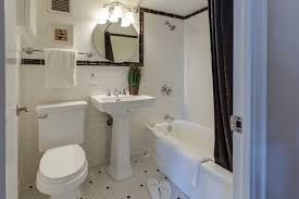 bathroom mirror and sconces
