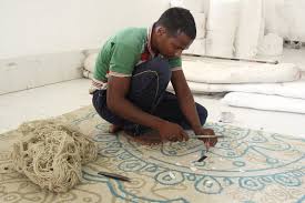 the story of hand knotted rugs in india