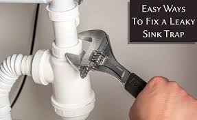 how to fix a leaky sink trap in kitchen