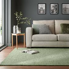 alto boucle wool rug green by dunelm
