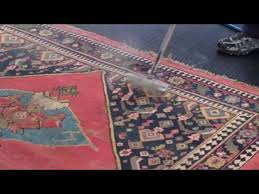watch as we wash an antique rug you