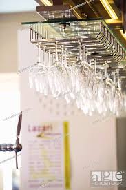 Wine Glasses Hanging Upside Down In A