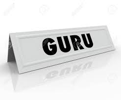 Guru Word On A White Tent Name Card To Illustrate A Speaker Or