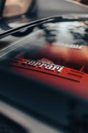 ferrari logo on a car free stock photo
