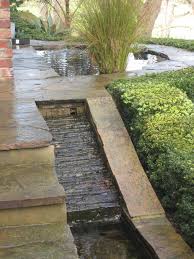 A Stone Rill Water Features In The Garden Backyard Water