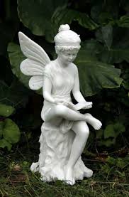 White Reading Fairy On A Log Statue By