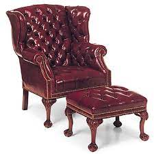 tufted leather wing back chair