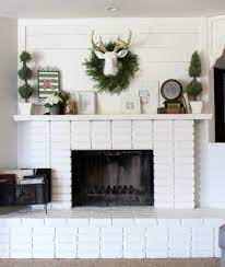 diy planked mantle and white brick