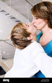 mother and son kissing Stock Photo - Alamy