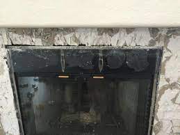 tile on top of fireplace surround