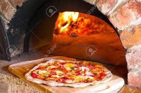 The idea is that this will help keep the smoke, and to a lesser degree, the heat, inside the oven. Rustic Homemade Pizza Baked In A Wood Fired Brick Oven With Fire Stock Photo Picture And Royalty Free Image Image 104242814