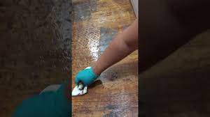 how to remove glue on hardwood floors