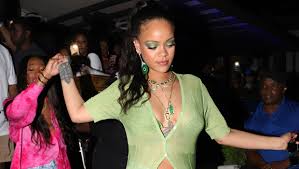 Rihanna was dancing to the music and bobbing her head and seemed to be in a good mood. Rihanna Attends Brother S Birthday Party In Green Bikini Top Denim Hollywood Life