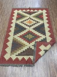 red green kilim rug knotted wool jute