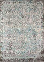 teal and grey area rug at rug studio
