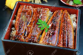 Japanese Food, Unajyu, Eel And Rice In A Lacquered Box Stock Photo, Picture  and Royalty Free Image. Image 38232659.
