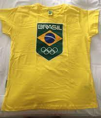 Para 2016, foi criado um novo logo, que faz a referência à bandeira brasileira, mas não tem nenhum símbolo olímpico. Camiseta Brasil Olimpiadas 2016 Camiseta Feminina Nunca Usado 39161218 Enjoei