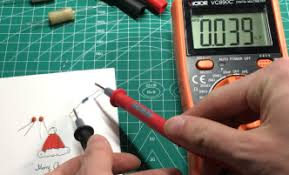 test an ac capacitor with a multimeter