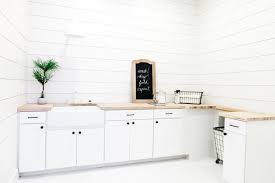 Diy faux butcher block countertop. White Laundry Room With Butcher Block Countertop Hgtv