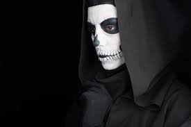 woman with skull makeup looking away
