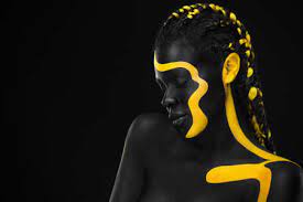 black body paint woman with face art