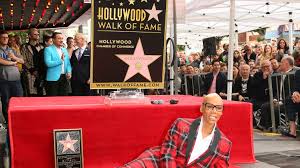 Each star has the name of the celebrity and an icon to represent what genre they are receiving the star for. Rupaul Is The First Drag Queen To Get A Star On The Hollywood Walk Of Fame Vogue