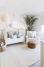 white and pink s nursery with pink