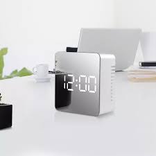 Modern, round, beveled, jade glass desk tabletop clock is fused securely in an arched aluminum base with a polished and brushed silver finish. Led Mirror Table Clock Digital Modern Alarm Clocks For Office Home Decoration Electronic Desk Clock Table Watch Time Date Temp Desk Table Clocks Aliexpress