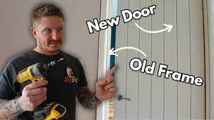 how to hang a new door in an old frame