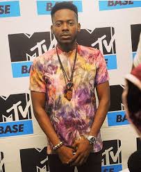 Adekunle gold was captured singing and spraying money on his wife, simi at his sister's wedding over the weekend. Adekunle Gold Wikipedia