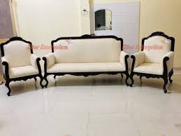 multicolor teak wood carved sofa set at