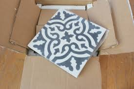 a cement tile backsplash in the kitchen