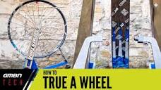 How To True A Bicycle Wheel | Mountain Bike Wheel Service - YouTube