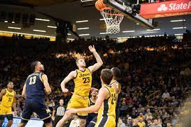 iowa men s basketball downed by