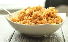 arroz con pollo slyh in the kitchen