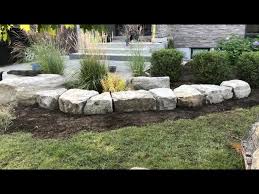 front yard with armour stones