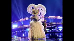 Kitty's appearance is that of a tabby cat, with a bushy tail and two different colored eyes: The Masked Singer Super 9 Kitty It S All Coming Back To Me Now Youtube