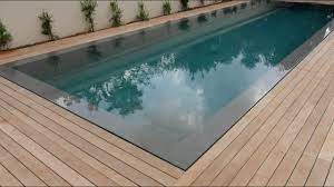 Our pool flooring is versatile, and many models have an easy drain through design, which means water flows right through them instead of pooling on the surface. Teak Decking Installation Around Swimming Pool With Hidden Fasteners Youtube Wood Pool Deck Pool Decks Wooden Pool Deck