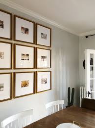 Use varied elements of 3d art along with frames, key hangers, letterings, and just about anything that you can think of. The Half Wall Grid Gallery Wall For 5x7 Photos Framebridge Gallery Wall Living Room Framebridge Gallery Wall Gallery Wall Layout