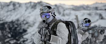 navy seal dressed in full snow weather tactical gear