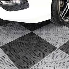 Our garage floor tiles in orange county provide a durable and style substitute for boring grey concrete floors. Plastipro Loc Heavy Duty Garage Floor Tiles