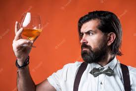 Premium Photo | Tasting and drink scotch whiskey bearded man in suspenders  drinking rum glass elegant businessman wear bow tie for formal event  sommelier true gentleman with alcohol brandy or cognac