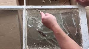 removing glass from an old window you