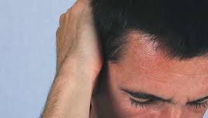 headache behind the ear causes