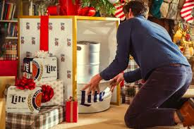 christmas tree stand holds a keg of beer