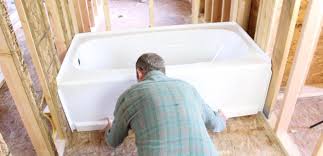 install a bathtub on concrete floor